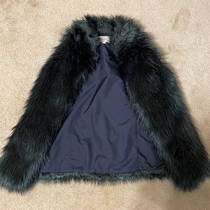 Black faux fur Loft vest. Never worn.